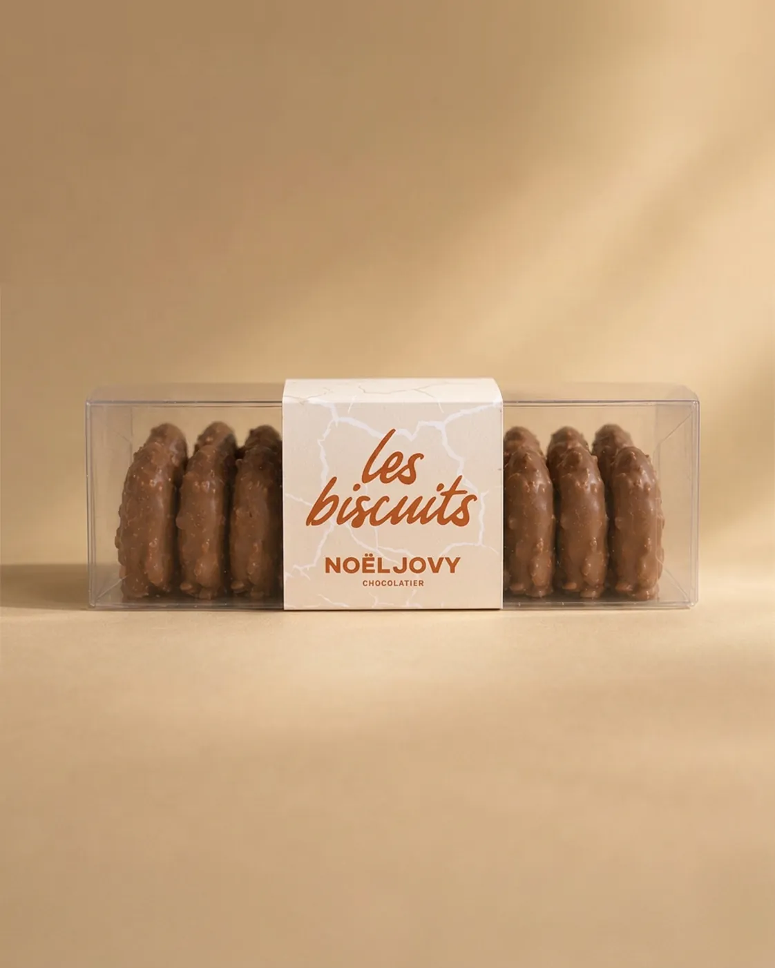 La réglette des biscuits Noël Jovy, bandeau craquelé et écriture cuivre